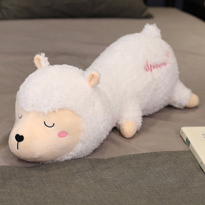 Lovely Alpaca Plush Toy Doll On The Bed